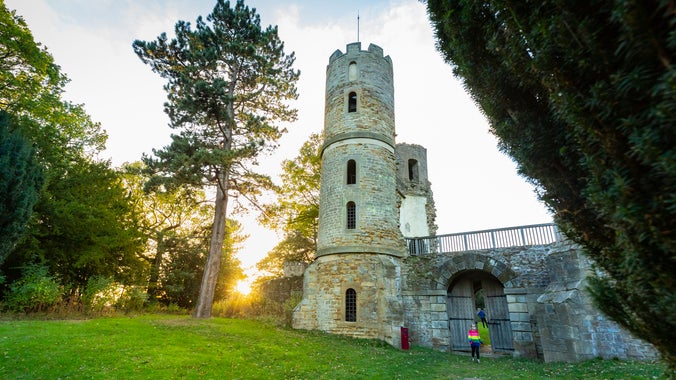 Visitors exploring the gothic folly 'Stainborough Castle' at Wentworth Castle Gardens, South Yorkshire